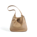 Cowhide Chic Wrinkled Underarm Bucket Tote Bag