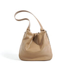 Cowhide Chic Wrinkled Underarm Bucket Tote Bag